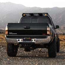 Load image into Gallery viewer, AlphaRex LED Tail Lights for Toyota Tacoma (2005-2015) Prismatic Nova Series with Sequential Signal - Alpha Black / Black Alternate Image