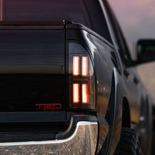 Load image into Gallery viewer, AlphaRex LED Tail Lights for Toyota Tacoma (2005-2015) Prismatic Nova Series with Sequential Signal - Alpha Black / Black Alternate Image