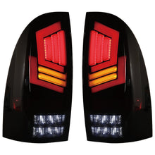 Load image into Gallery viewer, Winjet LED Tail Lights for Toyota Tacoma (2005-2015) with Sequential Turn Signal - Matte Black or Glossy Black CTWJ-0728 Alternate Image