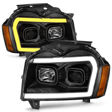 Load image into Gallery viewer, Anzo Projector Headlights for Jeep Grand Cherokee (2005-2007) with Switchback Plank Style DRL &amp; Black Housing 111543 Alternate Image