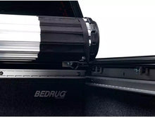 Load image into Gallery viewer, BAK Revolver X2 Tonneau Cover Dodge Ram 1500 5.7ft Bed (09-23) [w/ Ram Box] Truck Bed Hard Roll-Up Cover - Default Title Alternate Image