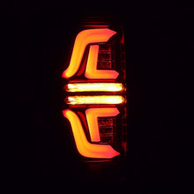 Load image into Gallery viewer, AlphaRex LED Tail Lights for Ford F250 F350 F450 F550 Super Duty (2017-2019) Pro Series with Blinking Signal - Jet Black / Red Smoke Alternate Image