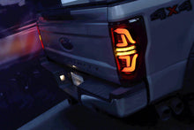 Load image into Gallery viewer, AlphaRex LED Tail Lights for Ford F250 F350 F450 F550 Super Duty (2017-2019) Pro Series with Blinking Signal - Jet Black / Red Smoke Alternate Image