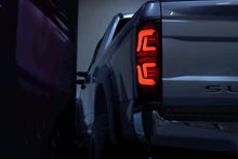 Load image into Gallery viewer, AlphaRex LED Tail Lights for Ford F250 F350 F450 F550 Super Duty (2017-2019) Pro Series with Blinking Signal - Jet Black / Red Smoke Alternate Image