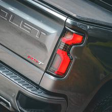 Load image into Gallery viewer, AlphaRex LED Tail Lights for Chevy Silverado 1500 (19-26) 2500HD / 3500HD (20-26) Luxx Series with Sequential Signal - Alpha Black / Black / Black Red Alternate Image