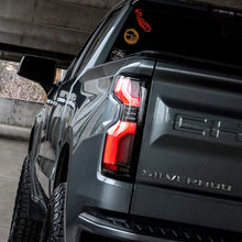 Load image into Gallery viewer, AlphaRex LED Tail Lights for Chevy Silverado 1500 (19-26) 2500HD / 3500HD (20-26) Luxx Series with Sequential Signal - Alpha Black / Black / Black Red Alternate Image