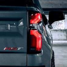 Load image into Gallery viewer, AlphaRex LED Tail Lights for Chevy Silverado 1500 (19-26) 2500HD / 3500HD (20-26) Luxx Series with Sequential Signal - Alpha Black / Black / Black Red Alternate Image