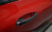 Load image into Gallery viewer, REVEL GT Dry Carbon Fiber Toyota GR Supra (2020) Door Handle Cover Set Alternate Image