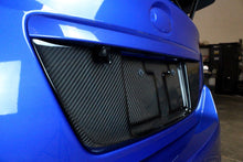 Load image into Gallery viewer, APR License Plate Backing Subaru WRX/ WRX STI Sedan (15-21) [Carbon Fiber] CBX-WRXLIC15 Alternate Image