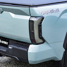 Load image into Gallery viewer, AlphaRex LED Tail Lights for Toyota Tundra (2022-2026) Prismatic NOVA-Series with Sequential Turn Signal - Black / Alpha-Black / Black-Red Housing Alternate Image