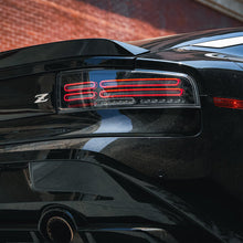 Load image into Gallery viewer, AlphaRex LED Tail Lights for Nissan Z (2023-2026) Quad Loop Style Prismatic Nova Series with Sequential Signal - Black or Alpha Black Alternate Image