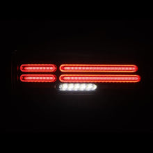 Load image into Gallery viewer, AlphaRex LED Tail Lights for Nissan Z (2023-2026) Quad Loop Style Prismatic Nova Series with Sequential Signal - Black or Alpha Black Alternate Image