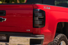 Load image into Gallery viewer, Morimoto Tail Lights Chevy Silverado (14-19) Sierra 3500HD (15-19) Gen 2 XB LED w/ Smoked or Red Lens - Smoked Alternate Image