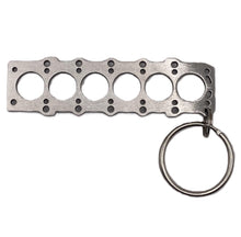 Load image into Gallery viewer, Metal keychain with a unique design on a white background Alternate Image