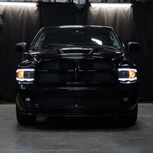 Load image into Gallery viewer, Spec-D Headlights Ram 1500 (02-05) Ram 2500/3500 (03-05) DRL LED Tube - Black / Chrome / Smoked - Euro Headlights / Matte Black / Clear Alternate Image