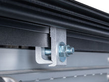 Load image into Gallery viewer, BAK Revolver X4s Tonneau Cover Nissan Frontier 5ft/6ft Bed (22-23) [w/ Factory Bed Rail Caps Only] Truck Bed Hard Roll-Up Cover Alternate Image