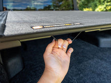 Load image into Gallery viewer, BAK Revolver X4s Tonneau Cover Nissan Titan 5.7ft Bed (17-23) Truck Bed Hard Roll-Up Cover Alternate Image