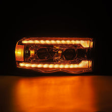 Load image into Gallery viewer, AlphaRex Projector Headlights Dodge Ram (02-05) Pro Series - Sequential - Alpha-Black / Black / Chrome - Black Alternate Image