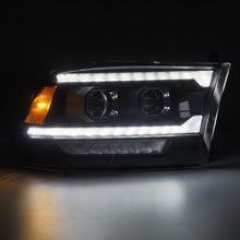 Load image into Gallery viewer, AlphaRex LED Projector Headlights Dodge Ram (09-18) [5th Gen Version LUXX Series - DRL Light Tube] Alpha-Black / Black / Chrome - Black / w/ Converter Alternate Image