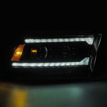 Load image into Gallery viewer, AlphaRex LED Projector Headlights Dodge Ram (09-18) [5th Gen Version LUXX Series - DRL Light Tube] Alpha-Black / Black / Chrome - Black / w/ Converter Alternate Image