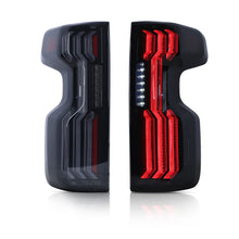 Load image into Gallery viewer, Attica 4x4 LED Tail Lights for Chevy Silverado 1500 (19-26) 2500/3500 (20-26) Gloss Black with Sequential Turn Signals - Clear or Smoked Lens Alternate Image