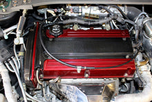 Load image into Gallery viewer, APR Spark Plug Cover Mitsubishi Lancer EVO 8 / 9 (03-07) [Carbon Fiber] CBE-EVOPLUG - Default Title Alternate Image