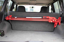 Load image into Gallery viewer, Fishbone Offroad Hi-Lift Jack Mount Jeep Cherokee XJ (84-01) Rear Seat Alternate Image