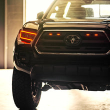 Load image into Gallery viewer, Oracle  Pre-Runner LED Grille Lights for Toyota Tacoma SR5 or TRD Pro (2016–2023) Tinted Amber Alternate Image