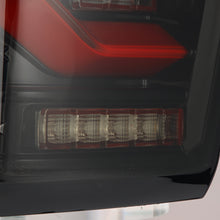 Load image into Gallery viewer, AlphaRex LED Tail Lights Toyota Tacoma (16-23) LUXX Series - Black  / Black-Red / Alpha-Black Alternate Image