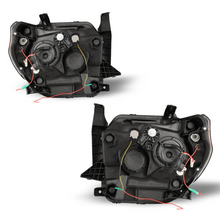 Load image into Gallery viewer, Winjet Headlights for Toyota Tundra (2014-2021) With Sequential Turn Signal - Black Housing with Clear Lens CHRNG0376-B-SQ - Default Title Alternate Image