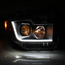 Load image into Gallery viewer, Winjet Headlights for Toyota Tundra (2014-2021) With Sequential Turn Signal - Black Housing with Clear Lens CHRNG0376-B-SQ - Default Title Alternate Image