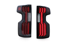 Load image into Gallery viewer, Attica 4x4 LED Tail Lights for Chevy Silverado 1500 (19-26) 2500/3500 (20-26) Gloss Black with Sequential Turn Signals - Clear or Smoked Lens Alternate Image