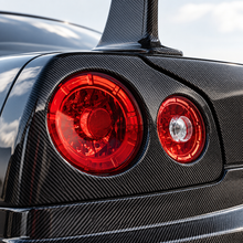Load image into Gallery viewer, Bull Boost carbon fiber rear taillight cover for Nissan Skyline R34 GT-R GTT and GT Alternate Image