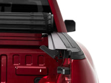 Load image into Gallery viewer, BAK Revolver X4s Tonneau Cover Toyota Tundra 5.7ft/6.7ft Bed (07-21) [w/o OE Track System] Truck Bed Hard Roll-Up Cover - 5.7ft Alternate Image