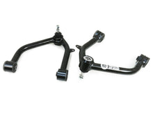 Load image into Gallery viewer, Two black suspension control arms on a white background Alternate Image