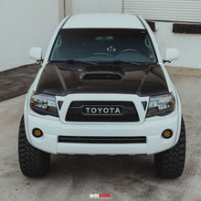 Load image into Gallery viewer, SEIBON Carbon Fiber Hood Toyota Tacoma (2005-2023) TR or TS Style - 05-11 / TR Style Alternate Image