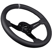 Load image into Gallery viewer, Black steering wheel with braided accents on a dark background Alternate Image