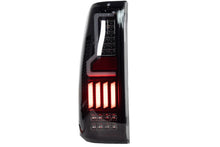Load image into Gallery viewer, Winjet LED Tail Lights Chevy Silverado (99-06) V2 Renegade w/ LED Lightbars - Black / Smoke Alternate Image