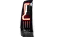 Load image into Gallery viewer, Winjet LED Tail Lights Chevy Silverado (99-06) V2 Renegade w/ LED Lightbars - Black / Smoke Alternate Image