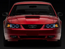 Load image into Gallery viewer, Raxiom Projector Headlights Ford Mustang SN95 (99-04) [Dual LED Halo] Black Housing/ Clear Lens Alternate Image