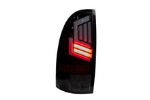 Load image into Gallery viewer, Winjet LED Tail Lights Toyota Tacoma (05-15) [Sequential] Black/Clear / Glossy Black/Clear / Black/Smoke Alternate Image