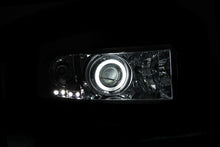 Load image into Gallery viewer, Anzo Projector Headlights Dodge Ram 1500 (94-01) 2500/3500 (94-02) Sport Model (94-98) [w/ CCFL Halo] Black or Chrome Housing - Black Alternate Image