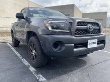 Load image into Gallery viewer, AlphaRex Dual LED Projector Headlights Toyota Tacoma [LUXX Series - DRL Light Tube] (05-11) Alpha-Black / Black / Chrome - Alpha-Black / With Converter Alternate Image