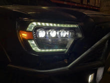 Load image into Gallery viewer, AlphaRex Quad 3D LED Projector Headlights Toyota Tacoma (2012-2015) [Nova Series - DRL Light Tube] Alpha-Black/Black - Alpha-Black Alternate Image