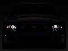 Load image into Gallery viewer, Raxiom Projector Headlights Ford Mustang S197 w/ Factory HID (13-14) [LED Halo] Black Housing/ Clear or Smoked Lens Alternate Image