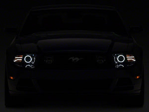 Raxiom Projector Headlights Ford Mustang S197 w/ Factory HID (13-14) [LED Halo] Black Housing/ Clear or Smoked Lens