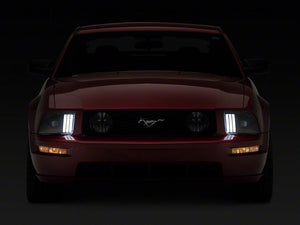 Raxiom Projector Headlights Ford Mustang S197 w/ Factory Halogen (05-09) Black Housing/ Clear or Smoked Lens