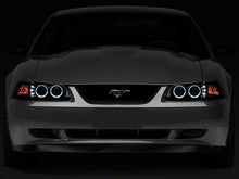 Load image into Gallery viewer, Raxiom Projector Headlights Ford Mustang SN95 (99-04) [Dual LED Halo] Chrome Housing/ Clear Lens or Black Housing/ Smoked Lens Alternate Image