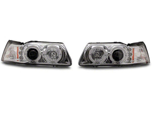 Raxiom Projector Headlights Ford Mustang SN95 (99-04) [Dual LED Halo] Chrome Housing/ Clear Lens or Black Housing/ Smoked Lens