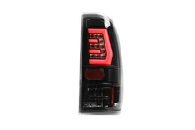 Load image into Gallery viewer, Winjet LED Tail Lights Ford F150 (97-03) Black/Clear / Glossy Black/Clear / Black/Smoke - Black/Clear Alternate Image